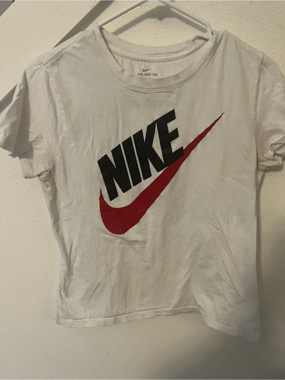 Nike White Short-Sleeve Tee with Red Swoosh and Black Logo